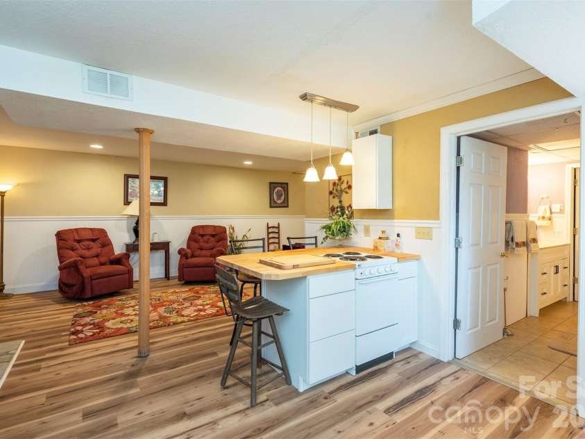 424 Lower Grassy Branch Road, Asheville, NC 28805.  MLS# CAR4403617, YatesRealty ID 42753. Lower level kitchen