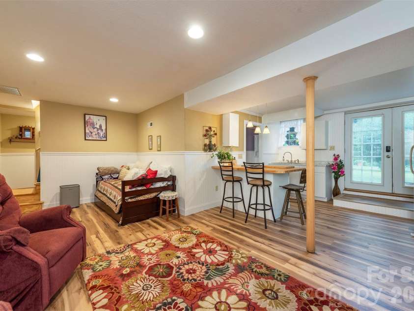 424 Lower Grassy Branch Road, Asheville, NC 28805.  MLS# CAR4403617, YatesRealty ID 42753. Lower Level open to kitchen.