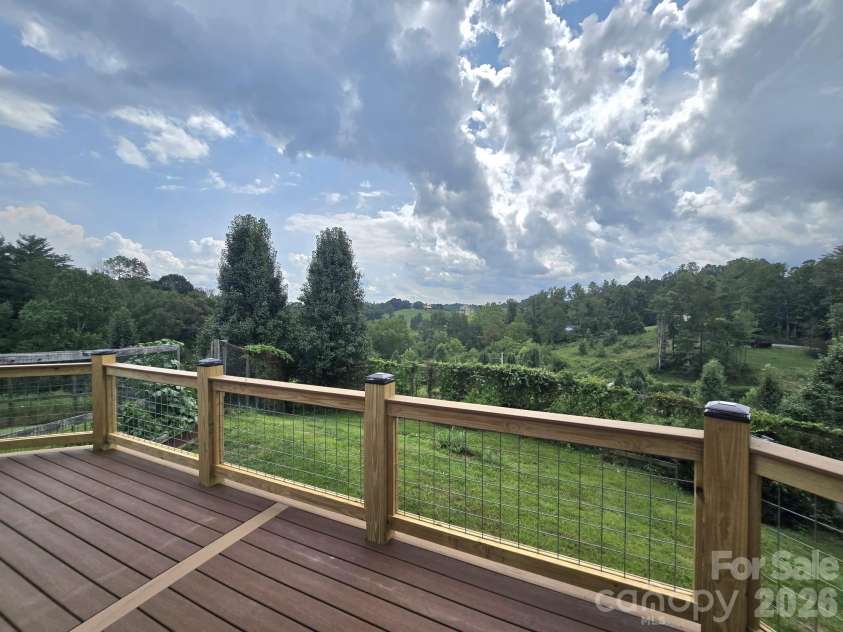 98 Tom Arthur Lane, Leicester, NC 28753.  MLS# CAR4410040, YatesRealty ID 42757. Large deck