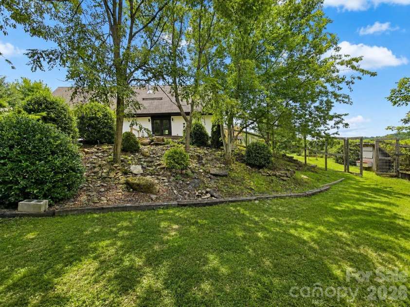 98 Tom Arthur Lane, Leicester, NC 28753.  MLS# CAR4410040, YatesRealty ID 42757. Privacy!