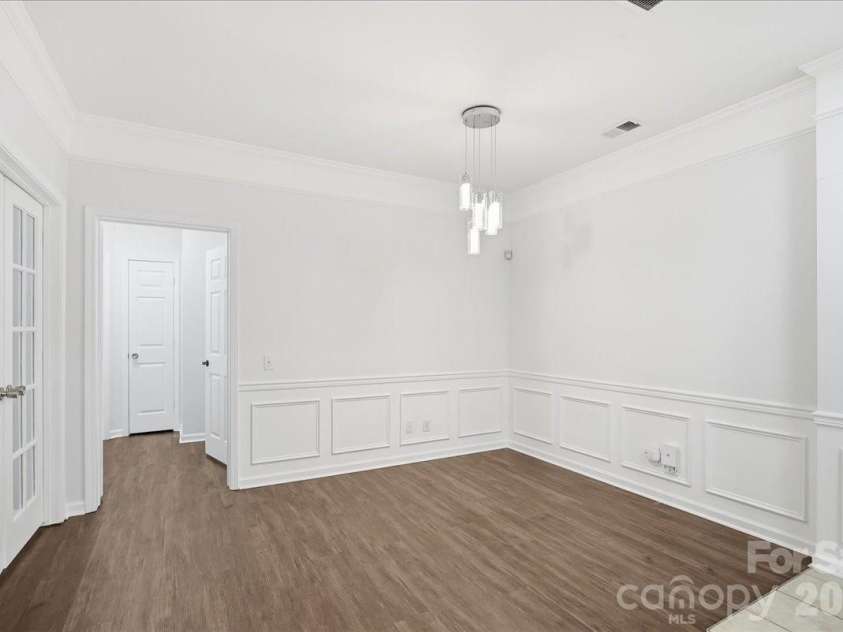 14817 Santa Lucia Drive, Charlotte, NC 28277.  MLS# CAR4412979, YatesRealty ID 42768. WAINSCOATING DINING AREA