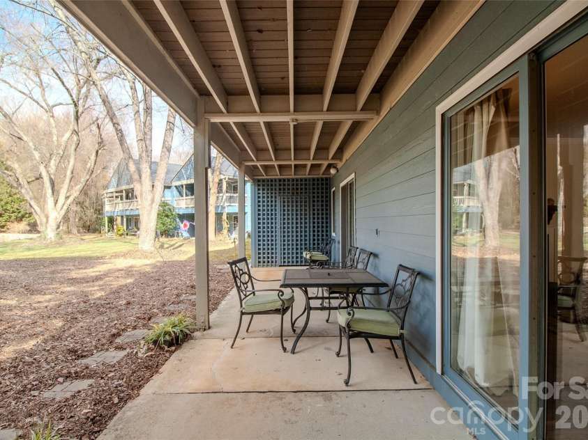 155 Tri Vista Drive, Lake Junaluska, NC 28745.  MLS# CAR4342321, YatesRealty ID 4278. Back porch with storage closet at the end