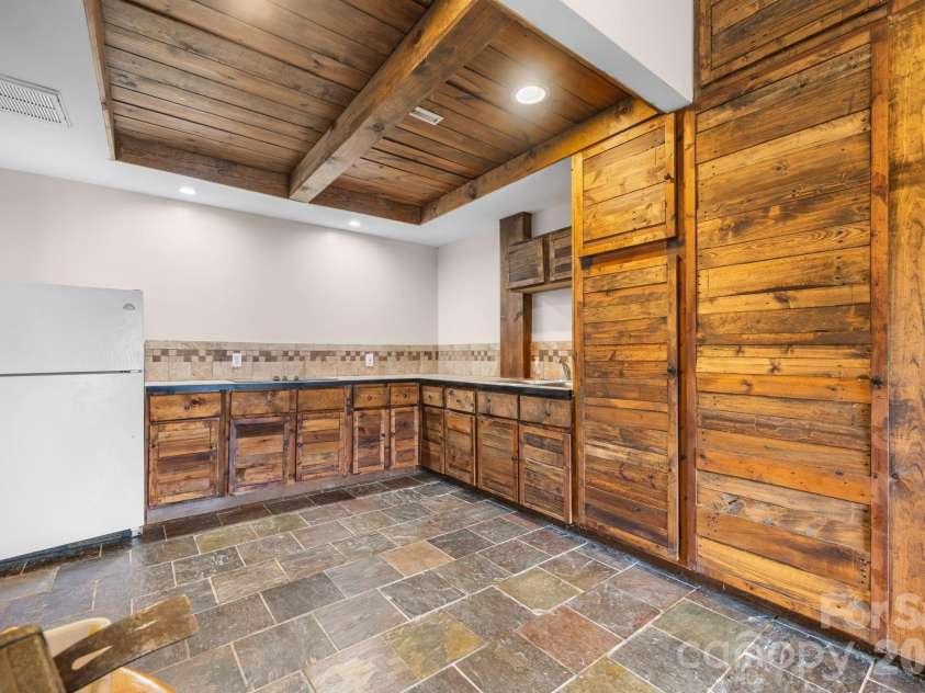 422 Ridge Creek Drive, Taylorsville, NC 28681.  MLS# CAR4425088, YatesRealty ID 42788. Lower Level Kitchenette