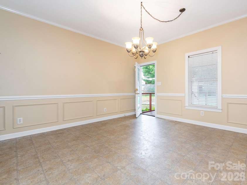 711 Spring Street, Concord, NC 28025.  MLS# CAR4411217, YatesRealty ID 42789. 