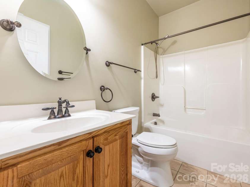 711 Spring Street, Concord, NC 28025.  MLS# CAR4411217, YatesRealty ID 42789. Hall bath