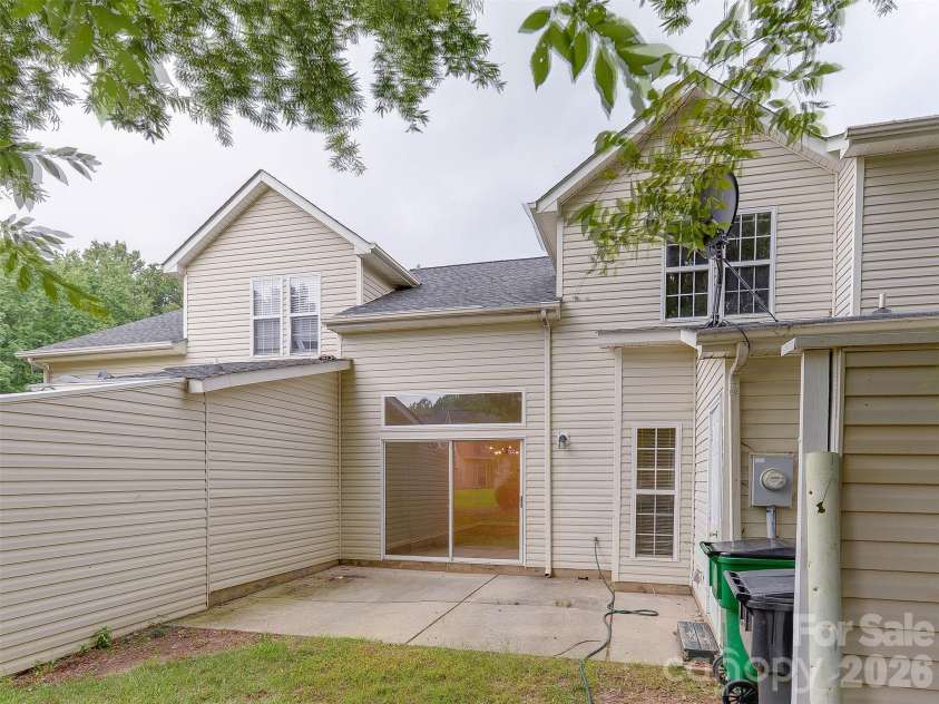 9128 Treyburn Drive, Charlotte, NC 28216.  MLS# CAR4412916, YatesRealty ID 42797. Backyard