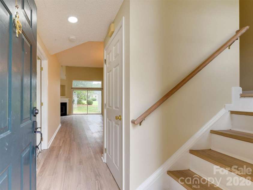 9128 Treyburn Drive, Charlotte, NC 28216.  MLS# CAR4412916, YatesRealty ID 42797. Front door