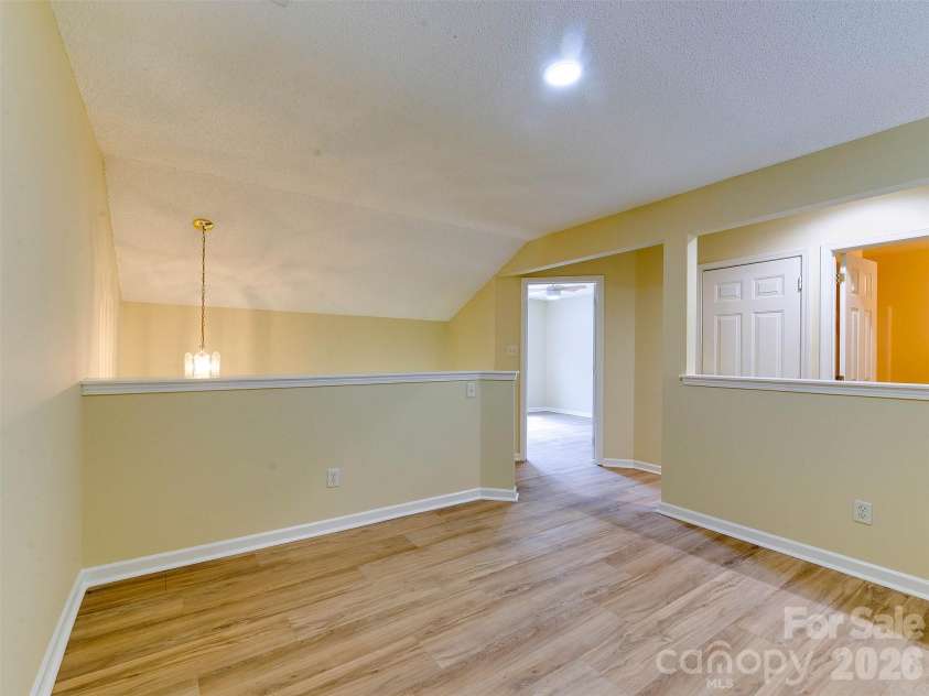 9128 Treyburn Drive, Charlotte, NC 28216.  MLS# CAR4412916, YatesRealty ID 42797. Loft area
