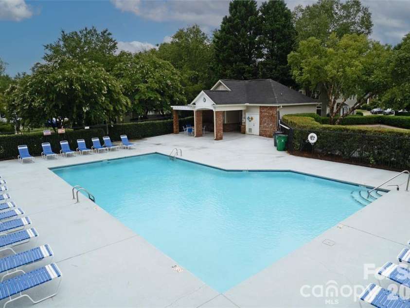 9128 Treyburn Drive, Charlotte, NC 28216.  MLS# CAR4412916, YatesRealty ID 42797. Pool