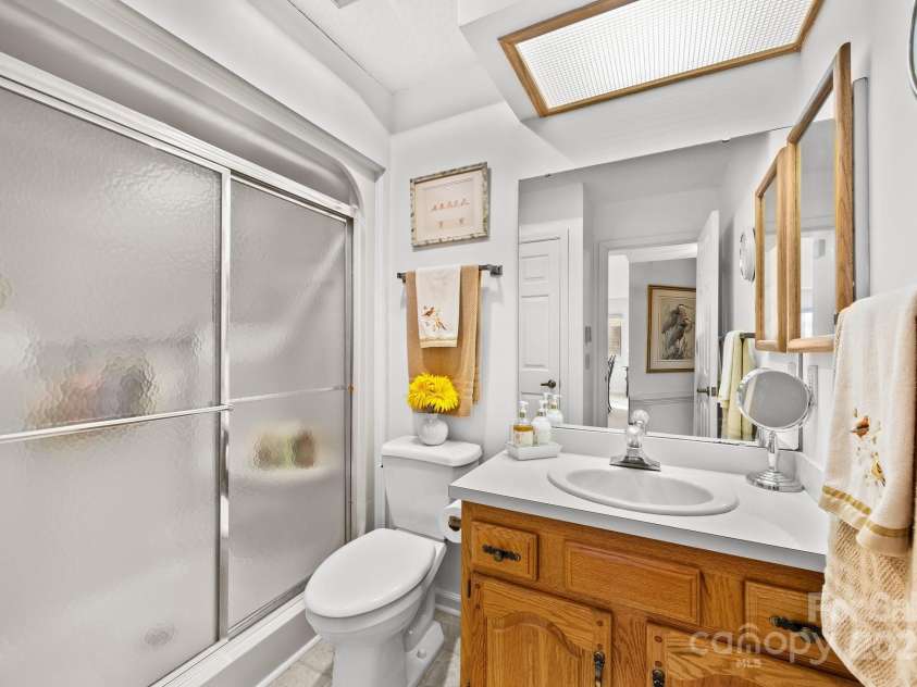 402 Laurel Oak Lane, Hendersonville, NC 28791.  MLS# CAR4220237, YatesRealty ID 4281. Tasteful. Nice guest-bath