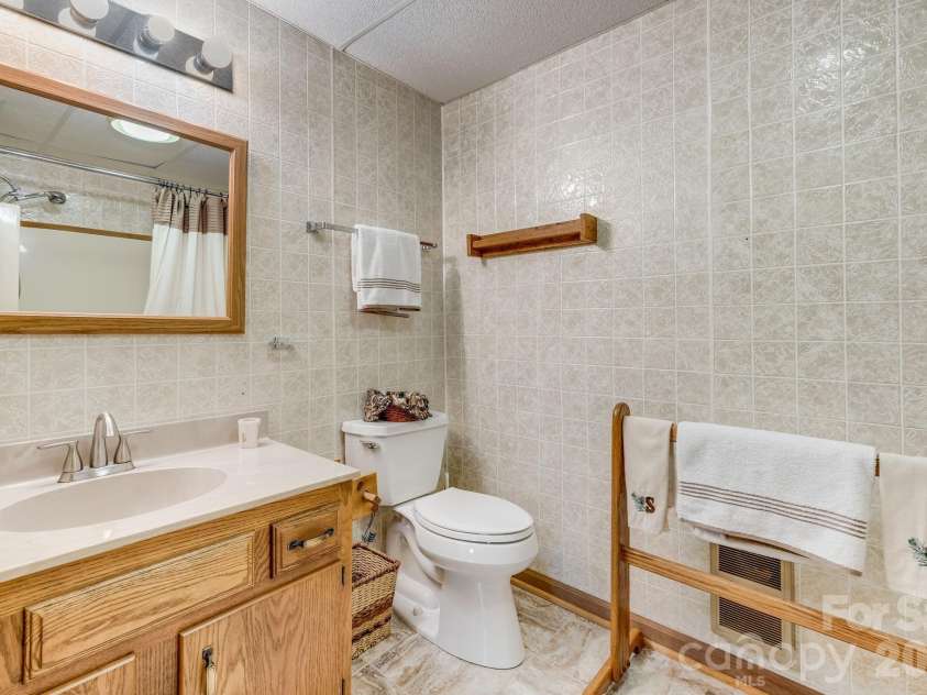 38 Bee Tree Lane, Mars Hill, NC 28754.  MLS# CAR4403271, YatesRealty ID 42812. Basement Bathroom