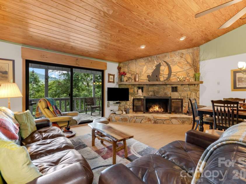38 Bee Tree Lane, Mars Hill, NC 28754.  MLS# CAR4403271, YatesRealty ID 42812. Great room fireplace