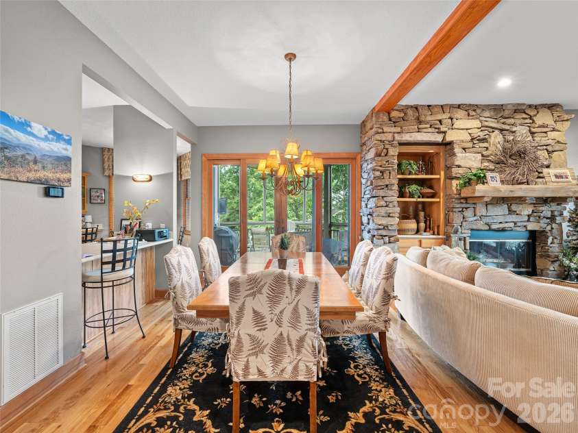 81 Stoney Falls Loop, Burnsville, NC 28714.  MLS# CAR4413097, YatesRealty ID 42820. Entry to enclosed porch