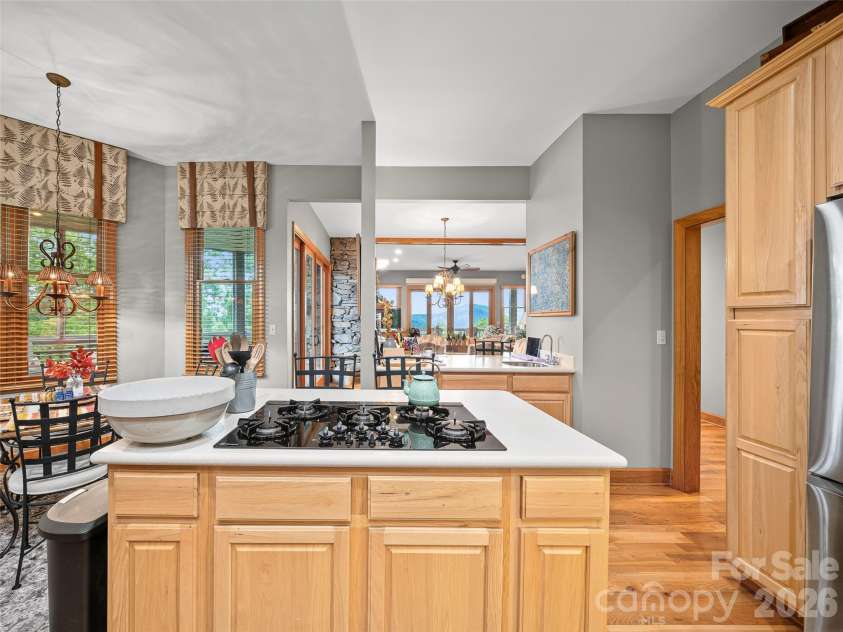 81 Stoney Falls Loop, Burnsville, NC 28714.  MLS# CAR4413097, YatesRealty ID 42820. Gas cooktop - kitchen island
