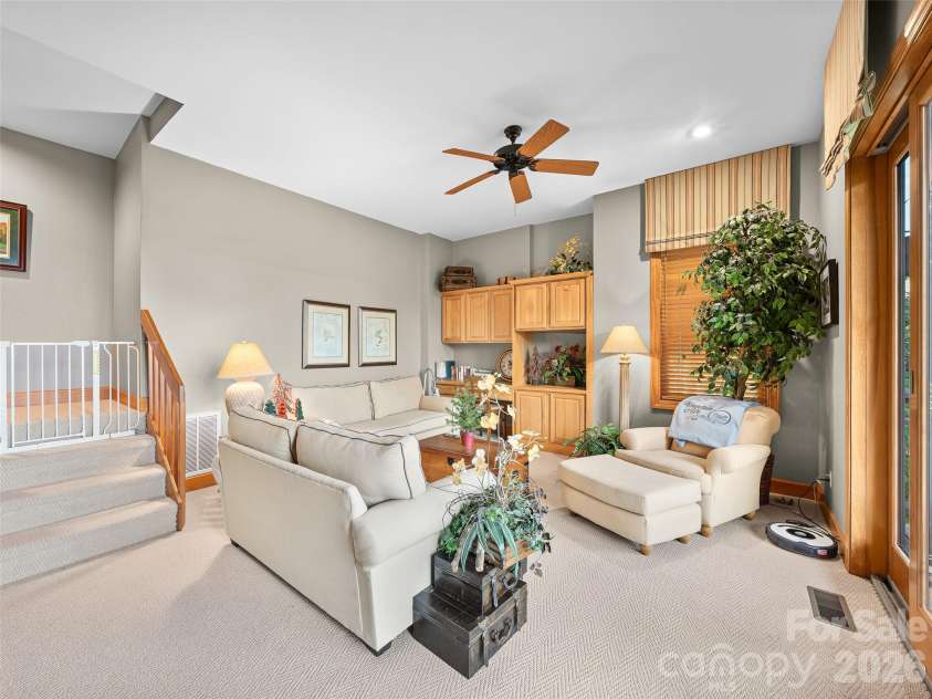 81 Stoney Falls Loop, Burnsville, NC 28714.  MLS# CAR4413097, YatesRealty ID 42820. Lower-level recreation room
