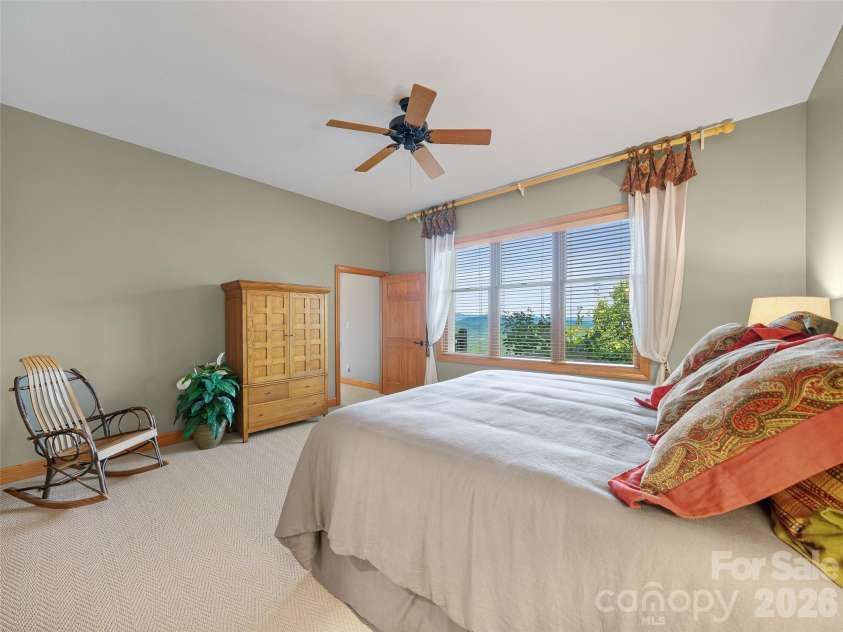 81 Stoney Falls Loop, Burnsville, NC 28714.  MLS# CAR4413097, YatesRealty ID 42820. Mountain views from every window