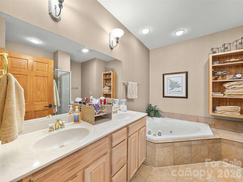 81 Stoney Falls Loop, Burnsville, NC 28714.  MLS# CAR4413097, YatesRealty ID 42820. Primary - ensuite