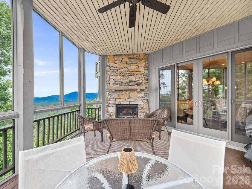 81 Stoney Falls Loop, Burnsville, NC 28714.  MLS# CAR4413097, YatesRealty ID 42820. Stone-stacked fireplace