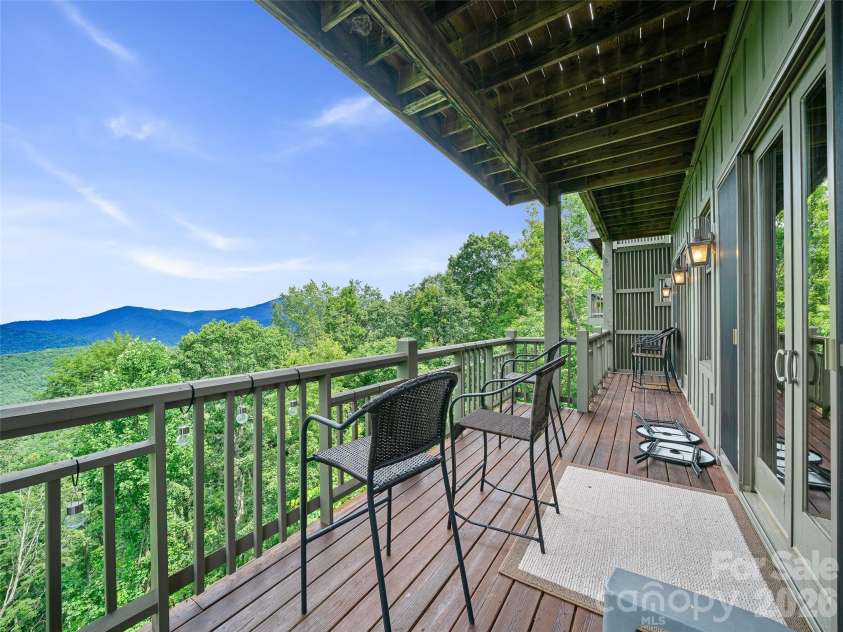 81 Stoney Falls Loop, Burnsville, NC 28714.  MLS# CAR4413097, YatesRealty ID 42820. Views from your covered deck