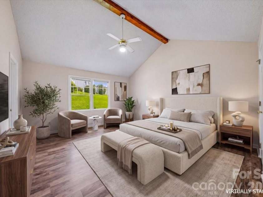 8012 Cadmium Court, Charlotte, NC 28215.  MLS# CAR4413036, YatesRealty ID 42822. Primary bedroom virtually staged