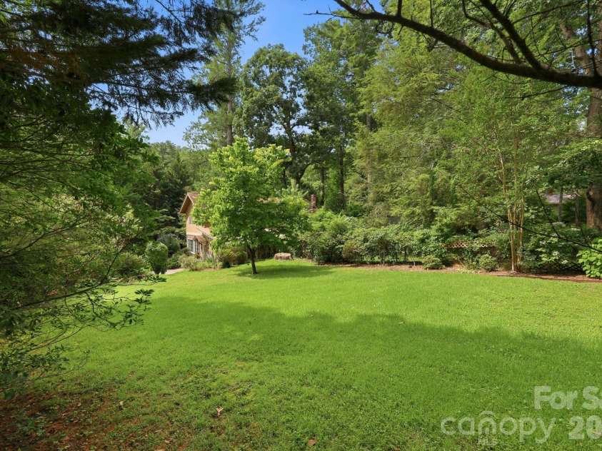 1925 Laurel Park Highway, Hendersonville, NC 28739.  MLS# CAR4410805, YatesRealty ID 42830. Open green space