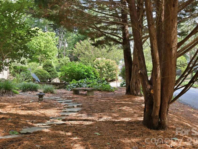 1925 Laurel Park Highway, Hendersonville, NC 28739.  MLS# CAR4410805, YatesRealty ID 42830. Tranquil walking paths