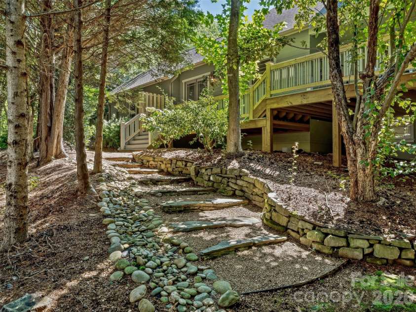 1606 Olmsted Drive, Asheville, NC 28803.  MLS# CAR4407499, YatesRealty ID 42832. Back yard path