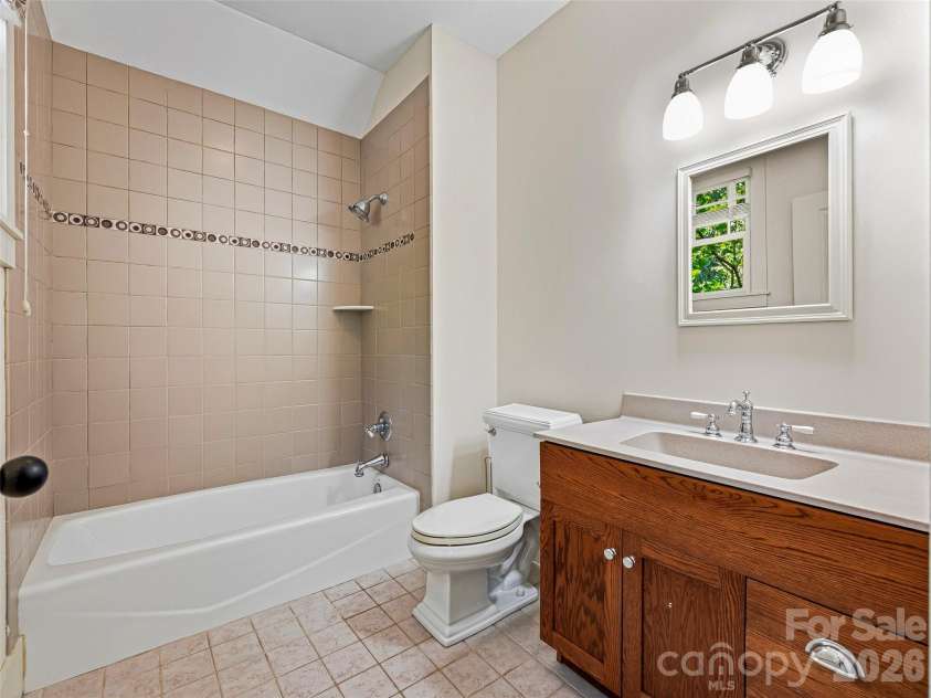 1606 Olmsted Drive, Asheville, NC 28803.  MLS# CAR4407499, YatesRealty ID 42832. Bath for suite