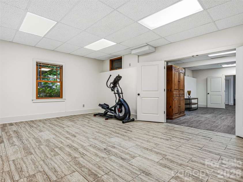 1606 Olmsted Drive, Asheville, NC 28803.  MLS# CAR4407499, YatesRealty ID 42832. Gym space