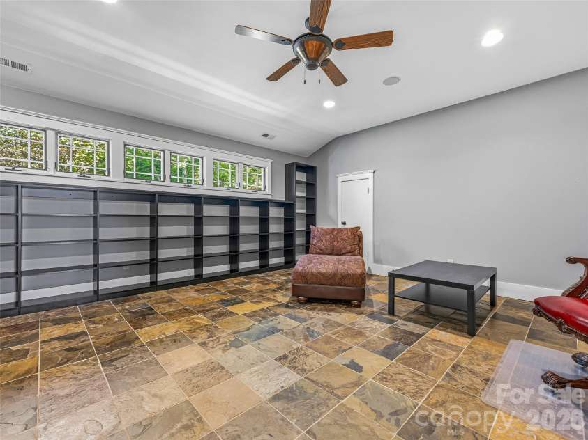 1606 Olmsted Drive, Asheville, NC 28803.  MLS# CAR4407499, YatesRealty ID 42832. Upstairs library