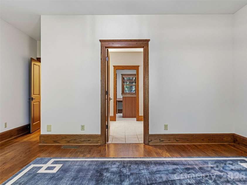 1606 Olmsted Drive, Asheville, NC 28803.  MLS# CAR4407499, YatesRealty ID 42832. View to primary bath