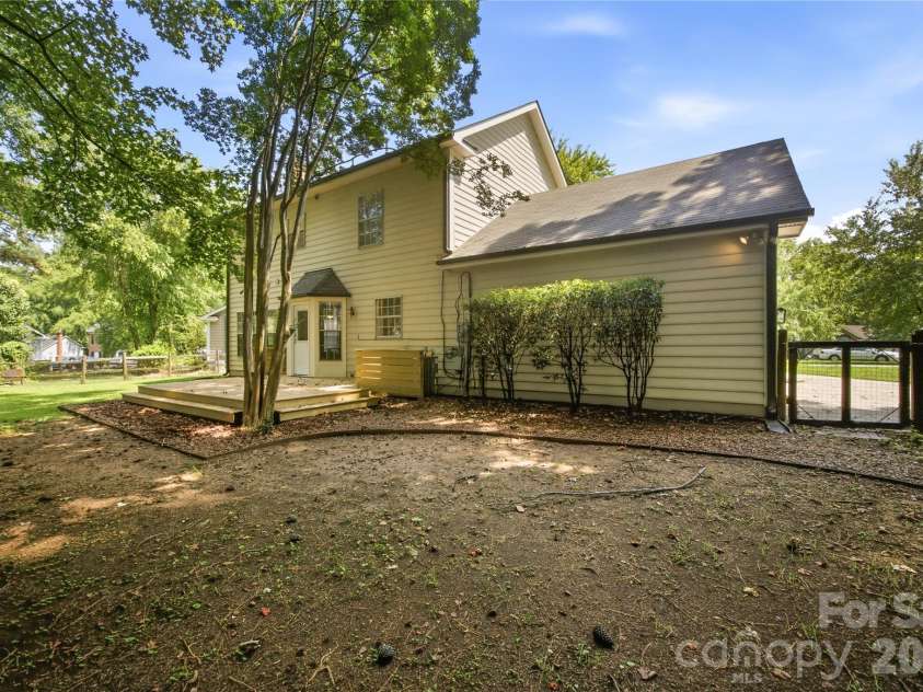 8802 Tarpan Court, Charlotte, NC 28216.  MLS# CAR4399661, YatesRealty ID 42833. Spacious back yard