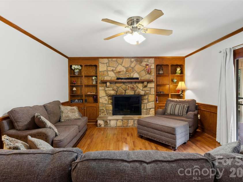 8601 Middleton Circle, Harrisburg, NC 28075.  MLS# CAR4407801, YatesRealty ID 42836. Beautiful fireplace and built ins