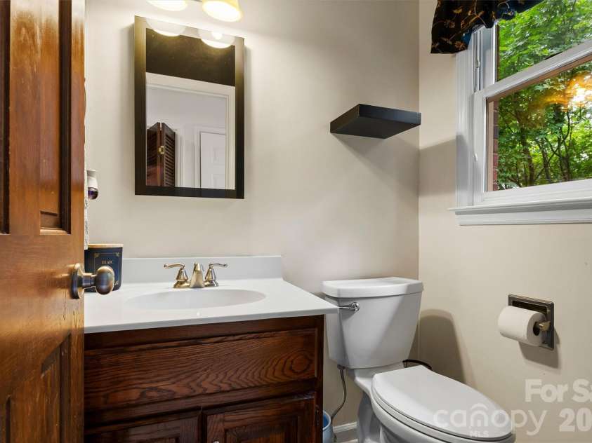 8601 Middleton Circle, Harrisburg, NC 28075.  MLS# CAR4407801, YatesRealty ID 42836. Half bath on main level