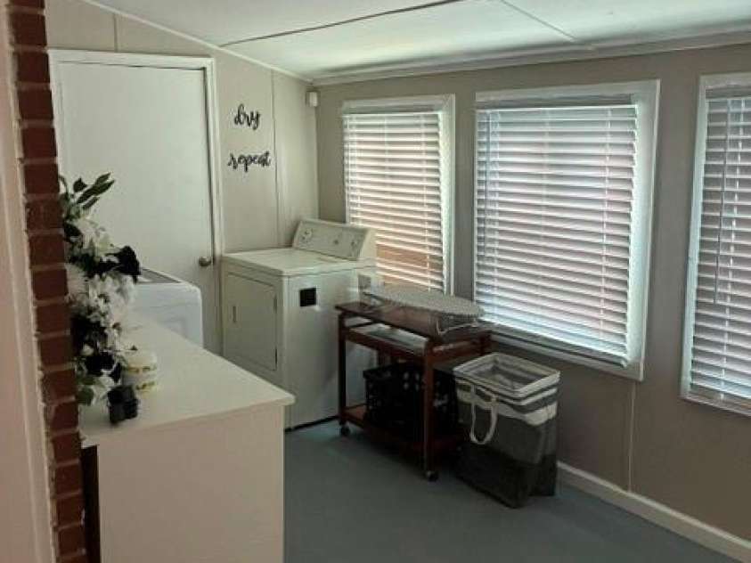 3208 Fitzgerald Place, Greensboro, NC 27405.  MLS# CAR4413021, YatesRealty ID 42858. Laundry Room