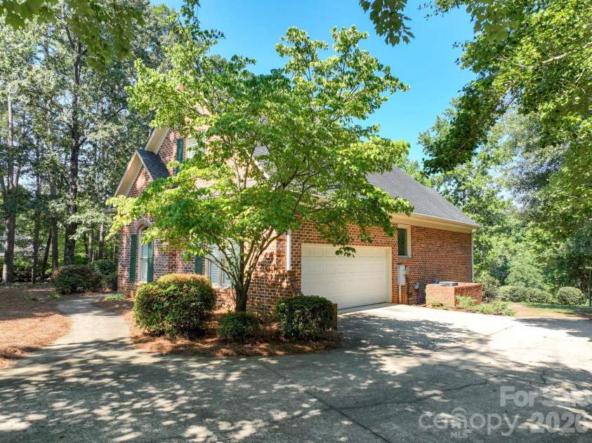 205 Piney Grove Point, New London, NC 28127.  MLS# CAR4409466, YatesRealty ID 42859. Garage