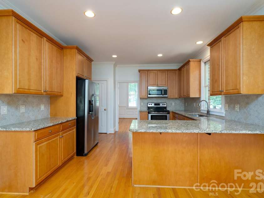 205 Piney Grove Point, New London, NC 28127.  MLS# CAR4409466, YatesRealty ID 42859. Kitchen