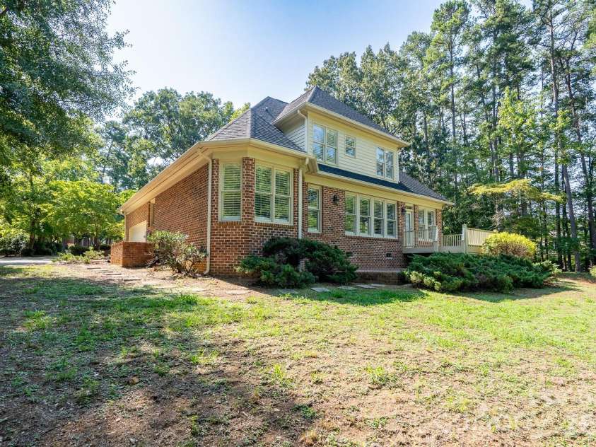 205 Piney Grove Point, New London, NC 28127.  MLS# CAR4409466, YatesRealty ID 42859. Rear View