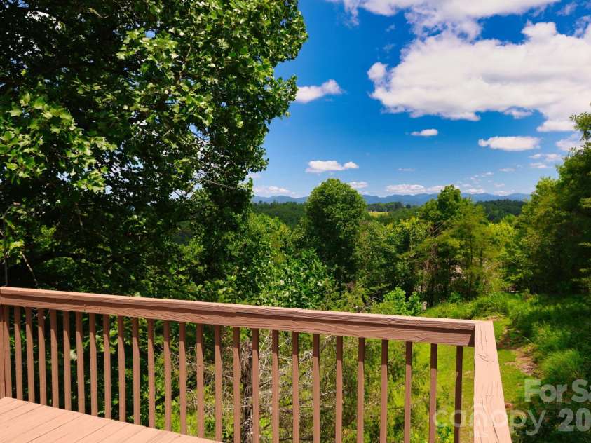 131 Macdougall Lane, Weaverville, NC 28787.  MLS# CAR4411011, YatesRealty ID 42869. Back Deck Mountain Views