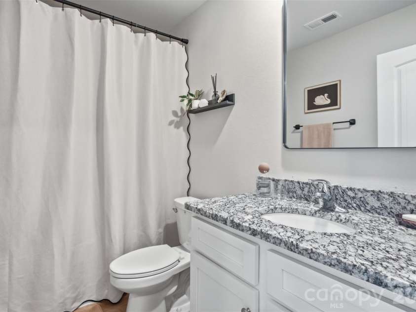 656 Lancelot Drive, Richburg, SC 29729.  MLS# CAR4347472, YatesRealty ID 4287. Bath 2 has a large vanity.