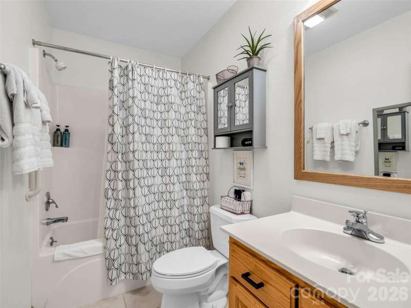 450 Windom Cove, Burnsville, NC 28714.  MLS# CAR4409160, YatesRealty ID 42870. Lower level bath