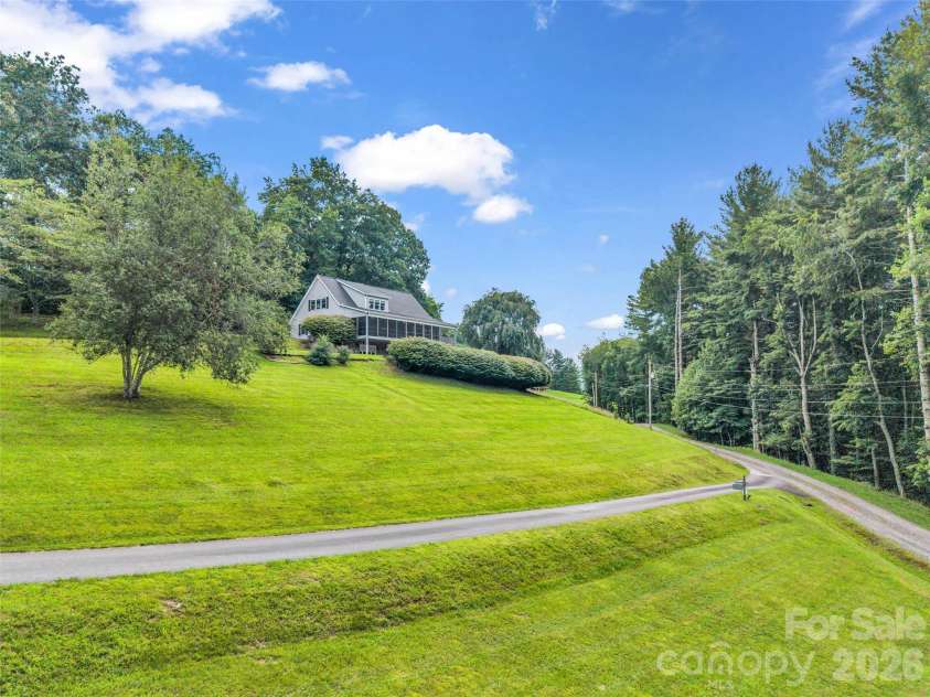 450 Windom Cove, Burnsville, NC 28714.  MLS# CAR4409160, YatesRealty ID 42870. Pastoral setting