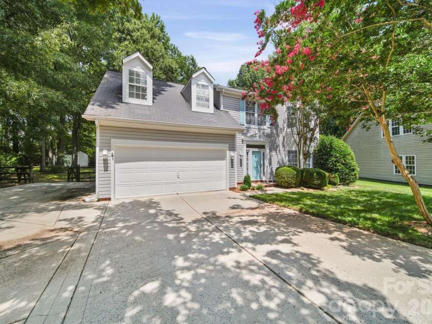 9136 Whittel Place, Charlotte, NC 28216.  MLS# CAR4402060, YatesRealty ID 42872. Additional parking pad to the left.