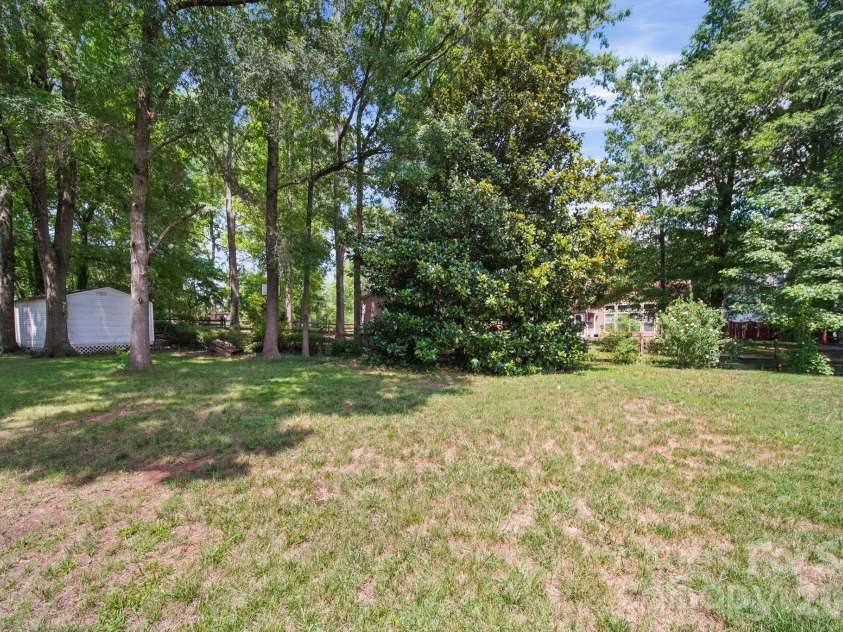 9136 Whittel Place, Charlotte, NC 28216.  MLS# CAR4402060, YatesRealty ID 42872. Expansive back yard. (Shed in rear).