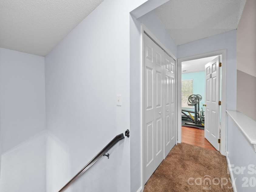 9136 Whittel Place, Charlotte, NC 28216.  MLS# CAR4402060, YatesRealty ID 42872. Upstairs hall.