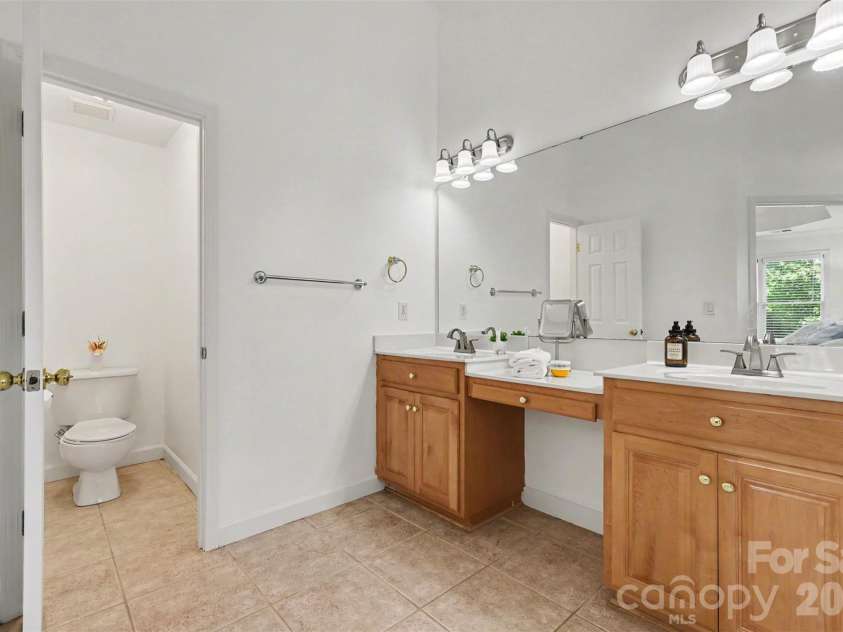 1208 High Brook Drive, Waxhaw, NC 28173.  MLS# CAR4409152, YatesRealty ID 42875. Double sinks with makeup counter