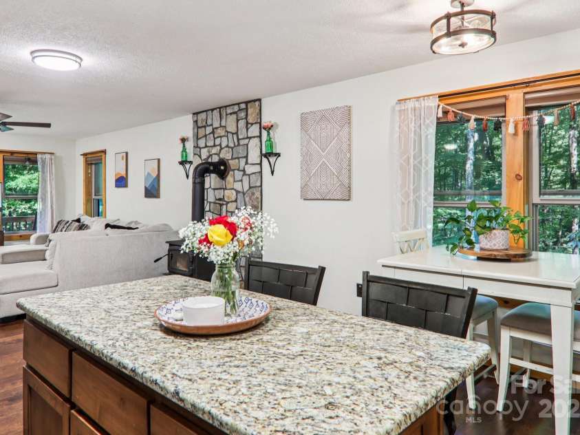 2171 Black Rock Road, Cherokee, NC 28719.  MLS# CAR4270256, YatesRealty ID 4288. Kitchen looking toward living room
