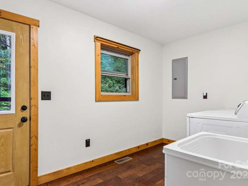 2171 Black Rock Road, Cherokee, NC 28719.  MLS# CAR4270256, YatesRealty ID 4288. Laundry room 