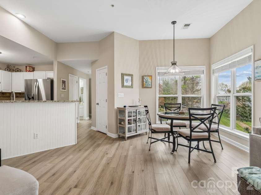 7844 Village Harbor Drive, Cornelius, NC 28031.  MLS# CAR4356496, YatesRealty ID 4288.  breakfast nook adds more square feet than interior units 