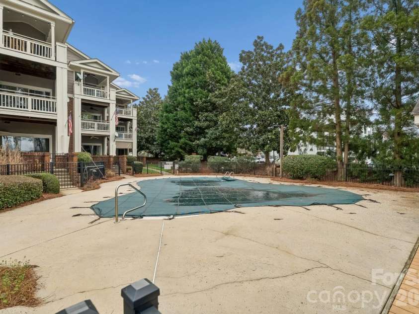 7844 Village Harbor Drive, Cornelius, NC 28031.  MLS# CAR4356496, YatesRealty ID 4288. Community pool